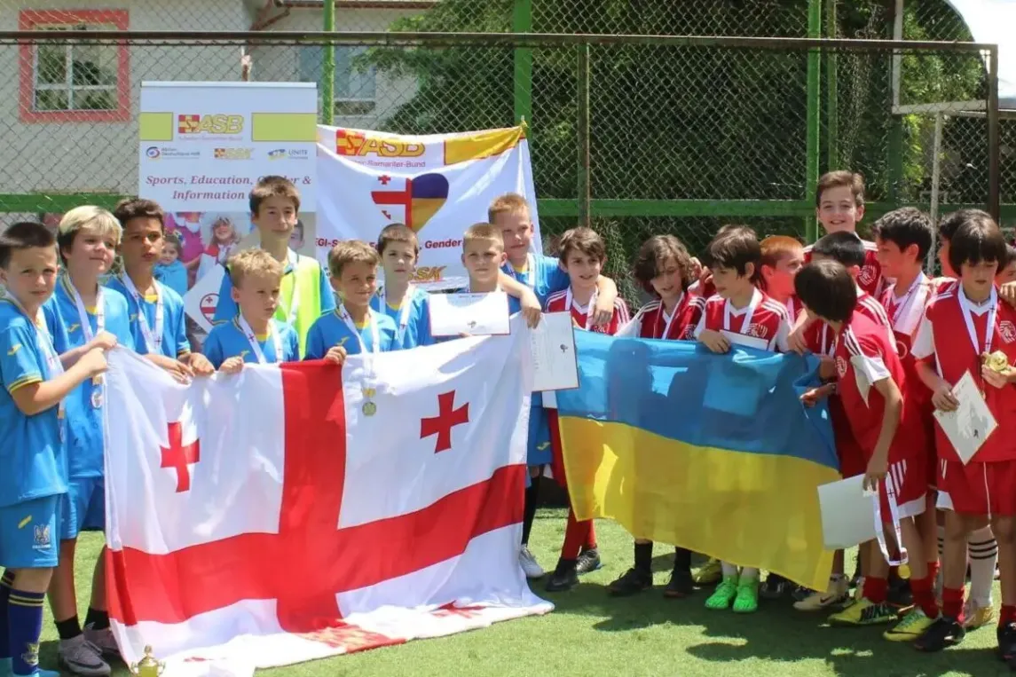 The photo shows a football match.webp