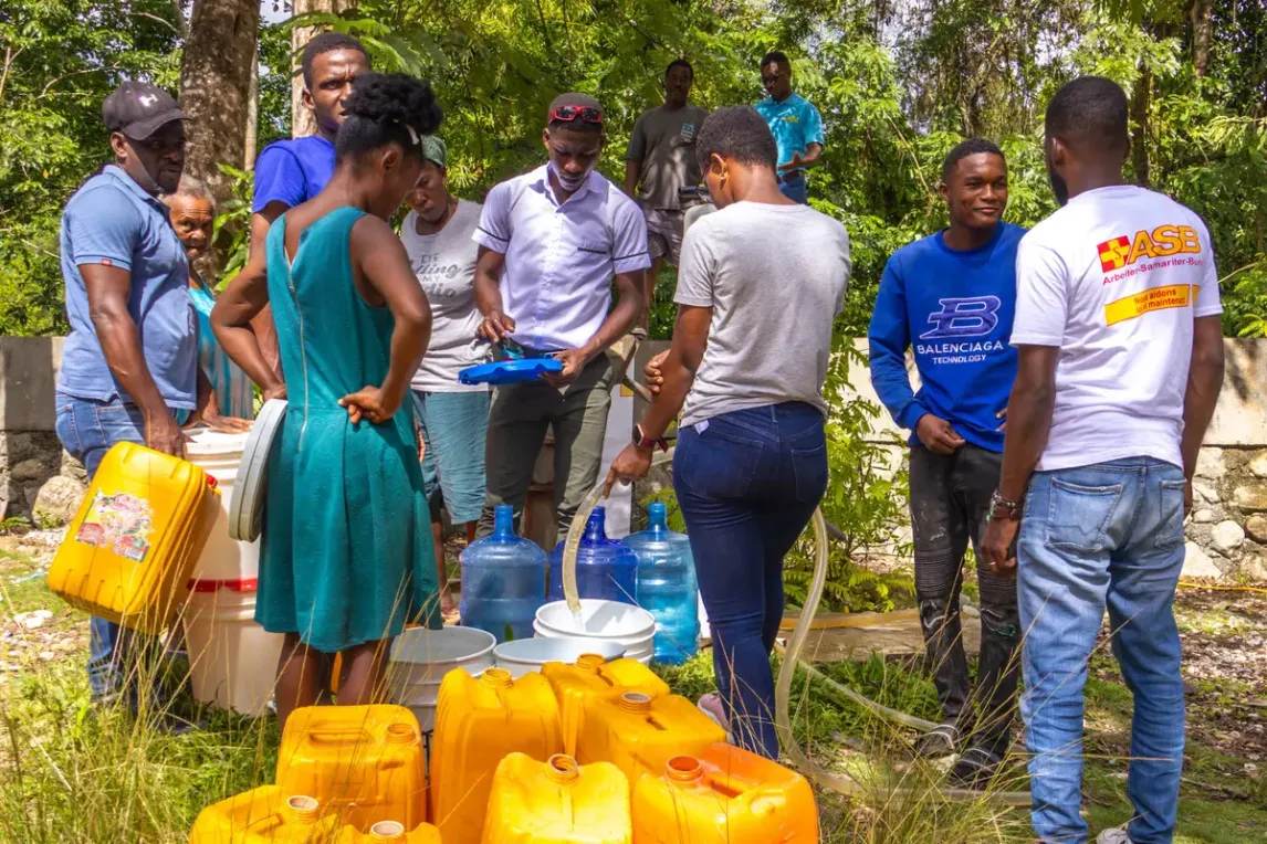 Water treatment with the sky hydrant in Camp Perrin (2) © ASB-Haiti_ Wismy.webp